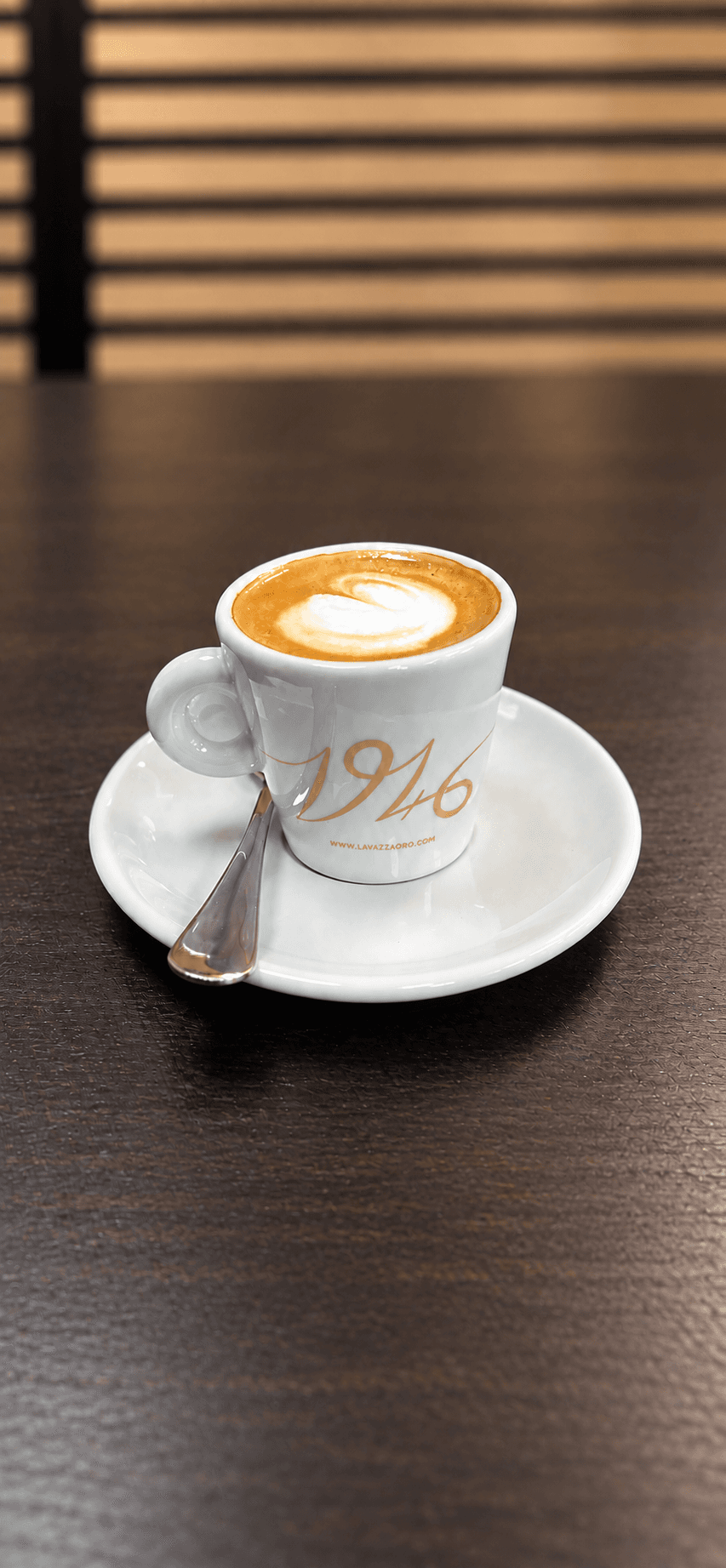 Macchiato in a white cup